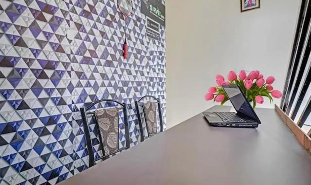Fabexpress Majestic Abode Inn Trippapur 호텔